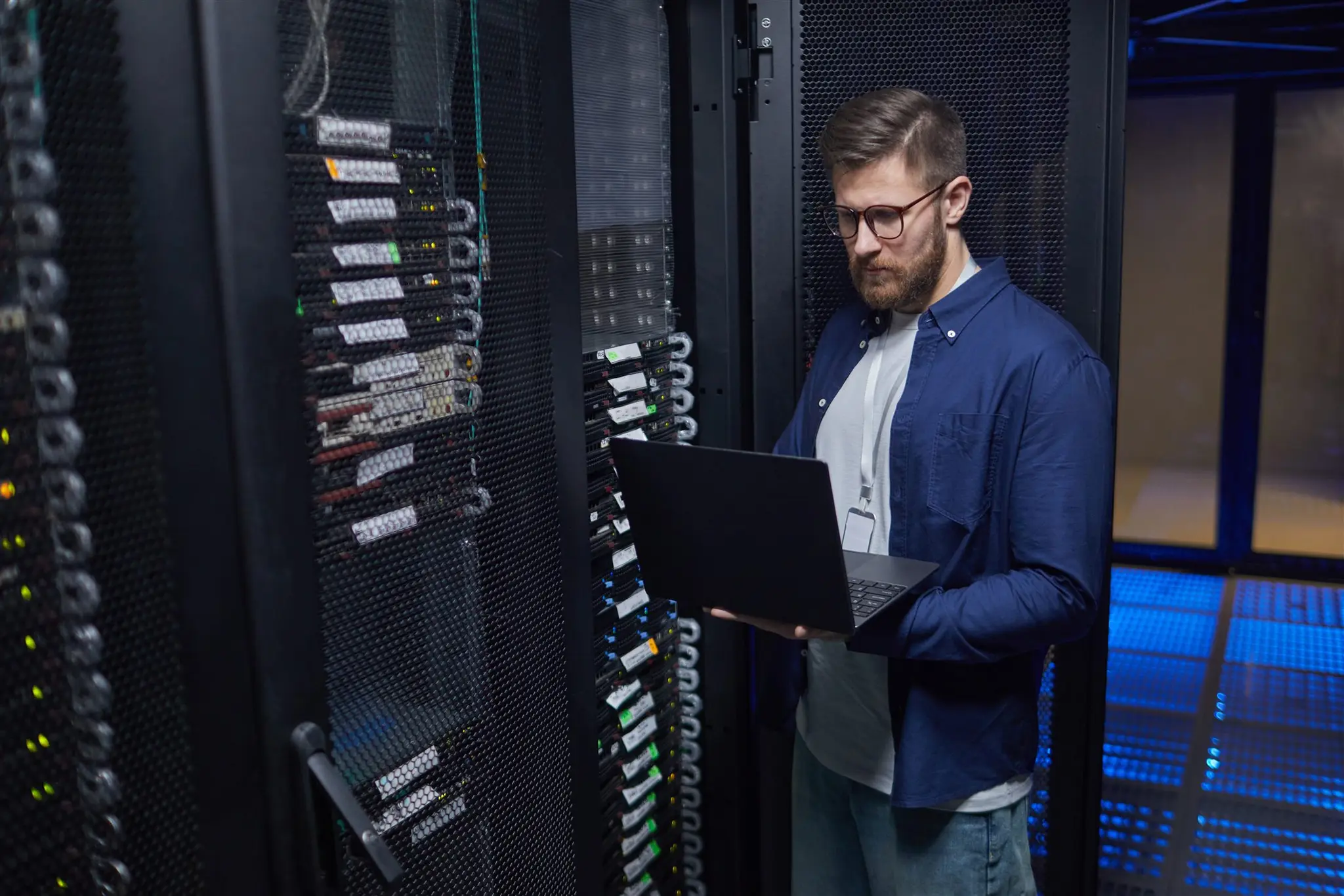 Engineer checking network equipment